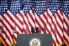 Empty Tribune for Speeches American President Against the American Flags Background.