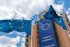 EU flag flying in front of the EU Commission building in Brussels