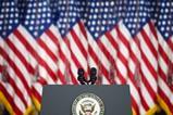 Empty Tribune for Speeches American President Against the American Flags Background.
