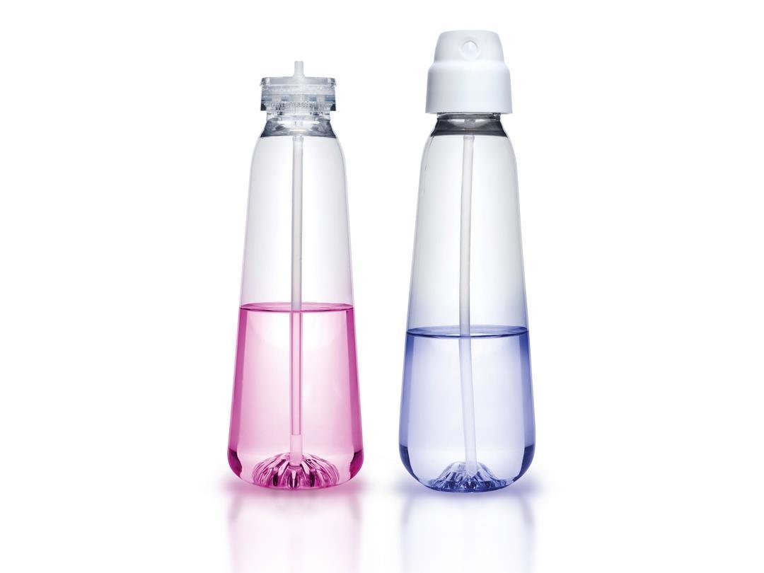 Two unlabelled, transparent plastic aerosol bottles sit side by side, containing pink and blue liquid, respectively. The…
