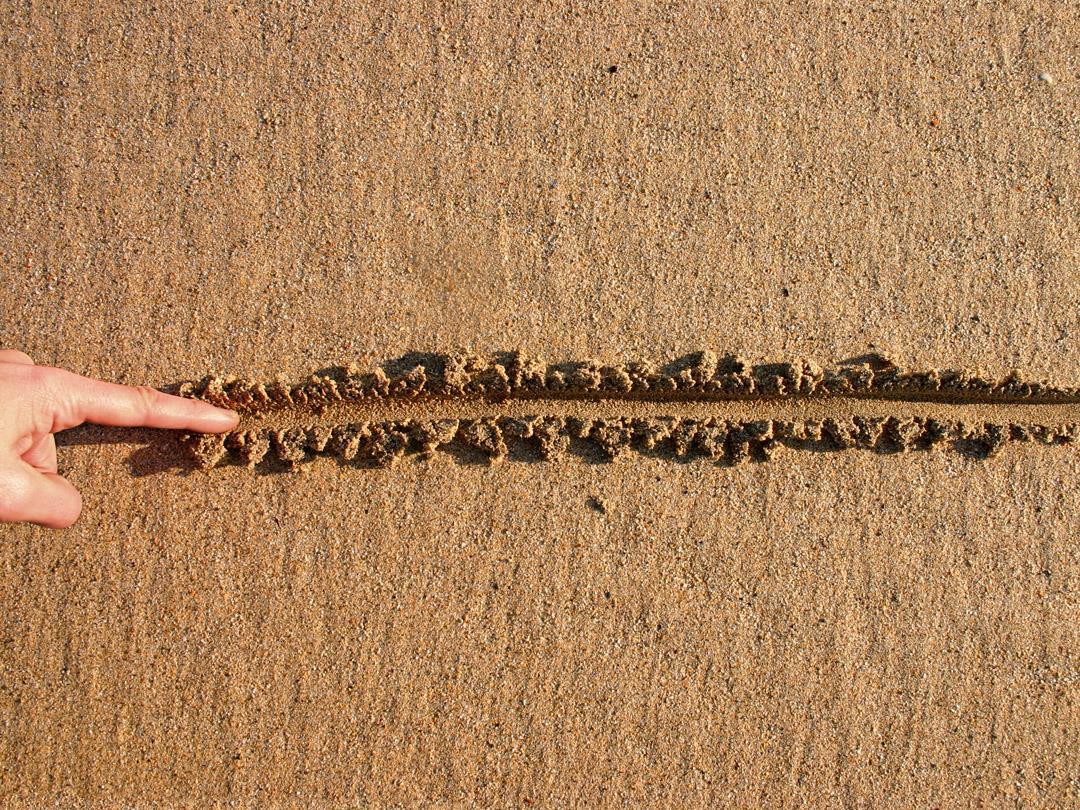 drawing line in sand.jpg