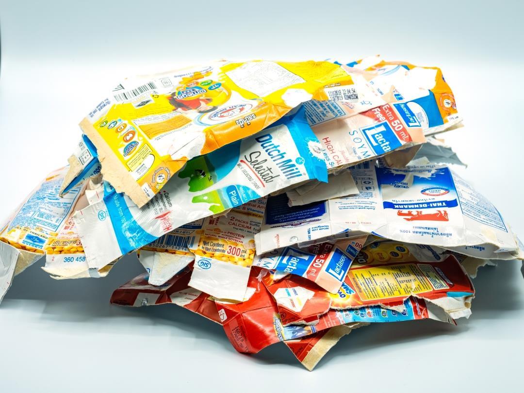 A pile of flattened milk cartons.