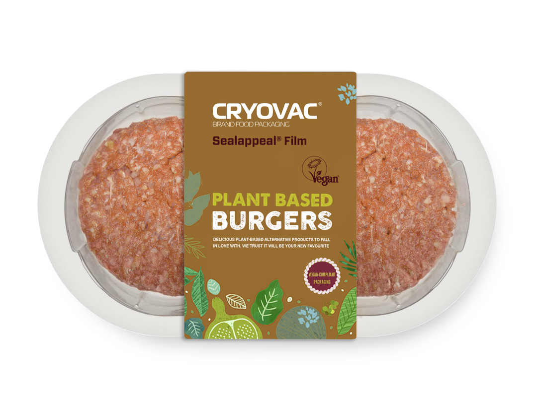 A pack containing plant-based burgers. The packaging is made of transparent plastic with a paperboard sleeve, which reads…