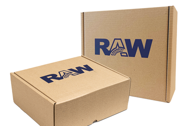 Two brown boxes against a white background. One is laying flat, one standing upright. Both have the 'RAW' logo printed on them in a dark blue font.