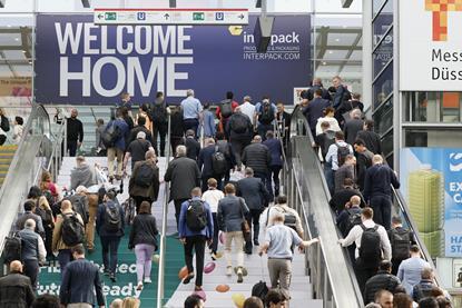 A picture from interpack, with people milling around in an event hall