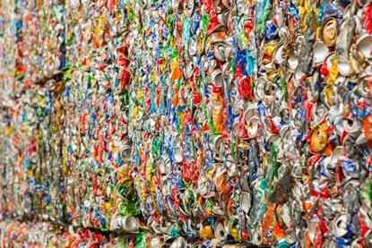 Crushed aluminium cans collected into cubes