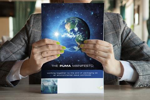 PUMA Manifesto cover in the hand (003).jpg