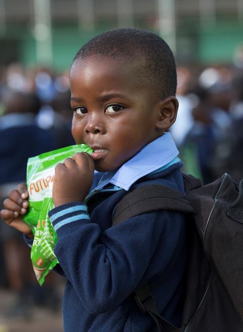 Child with Futurelife pouch.jpg