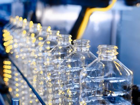 Polyethylene bottles on a factory line.