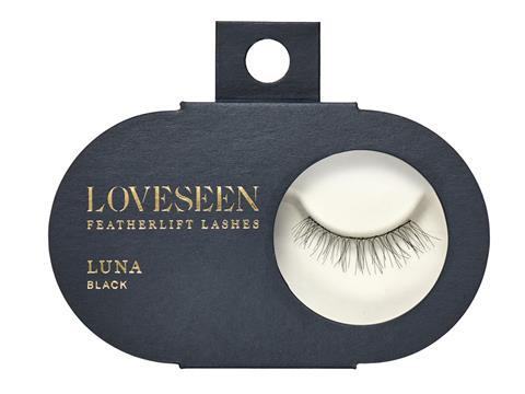 A matte, black, ovular box made of paperboard. It reads 'Loveseen Featherlift Lashes, Luna Black', and contains a round plastic window on the right side, displaying one set of false eyelashes.