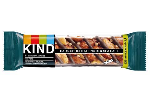 KIND's Dark Chocolate, Nuts and Sea Salt bar is wrapped in flexible plastic. It features a transparent window to see the bar inside, with a black strip featuring the KIND logo on one end of the bar and a green strip reading 'KIND uses recycled plastic'.