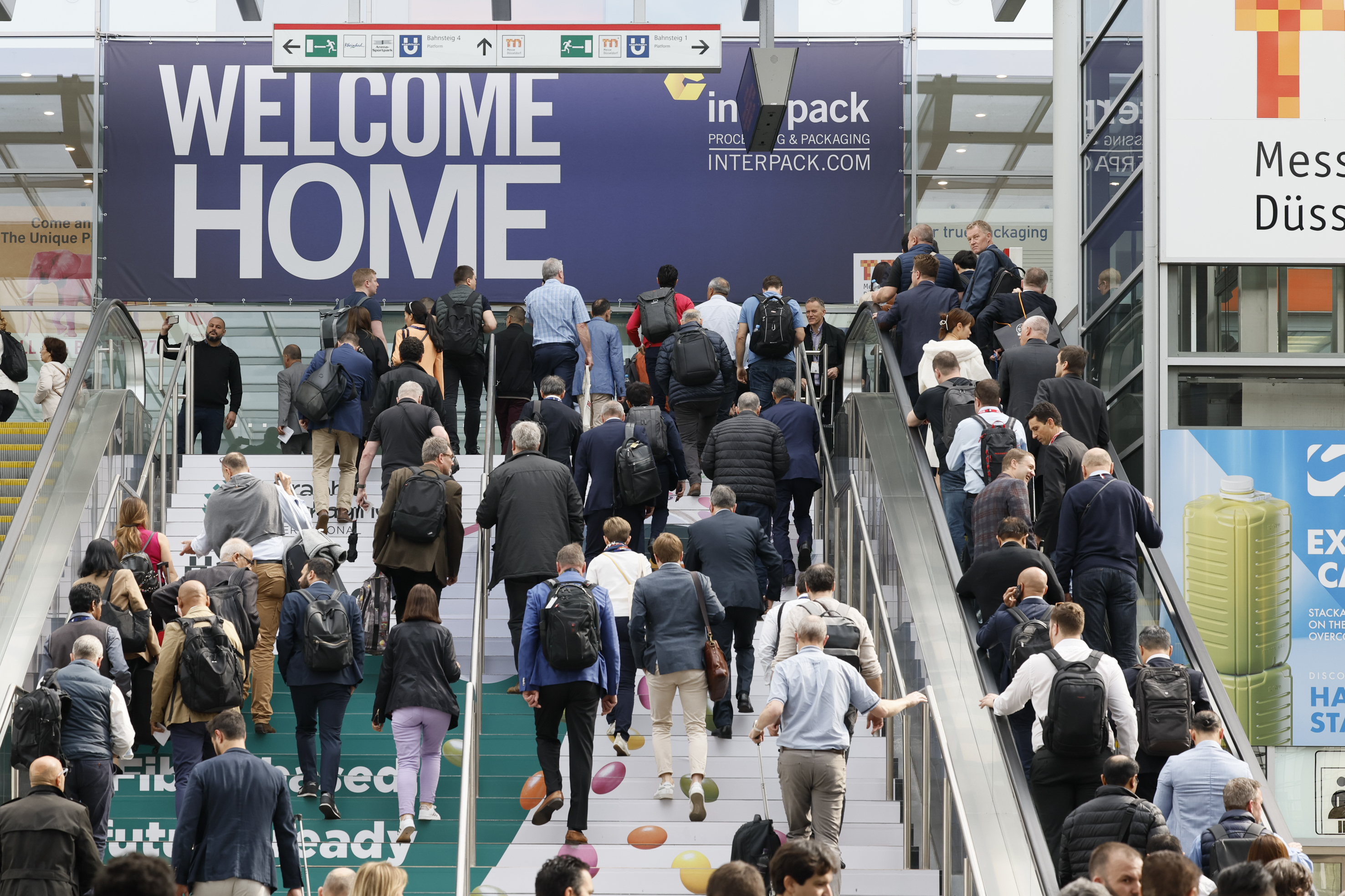 A picture from interpack, with people milling around in an event hall